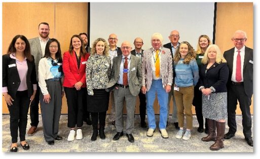 The Greater Brighton Economic Board and DBT officers pose for a group photo, standing in two rows.